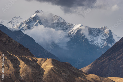 Snow Karakoram mountains peak view from Gilgit, Pakistan