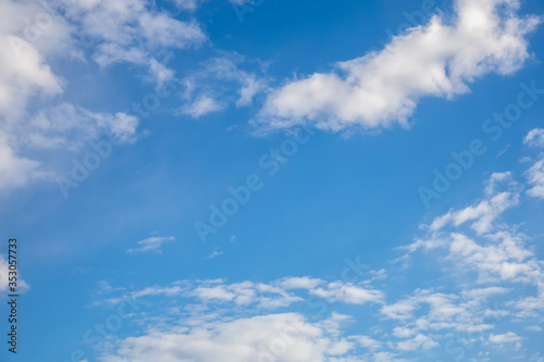 Blue sky with white clouds, background