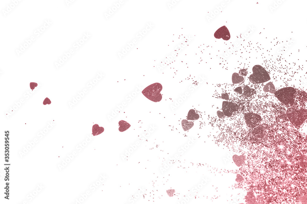Pink glitter hearts on white background 