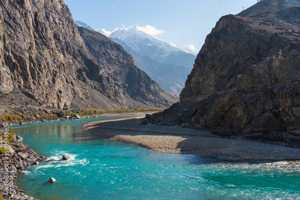 Beautiful Ghizer river in autumn season, Hindu Gush mountains range in Gilgit Baltistan, Pakistan Beautiful Ghizer river in autumn season, Hindu Gush mountains range in Gilgit Baltistan, Pakistan