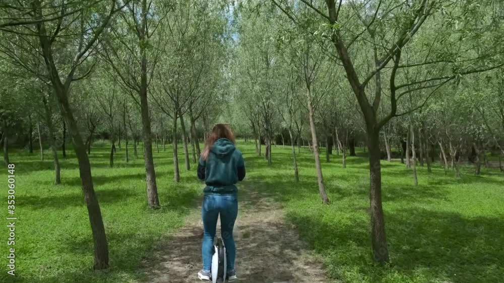 Electric unicycle ride through lush green forest 4K 60fps Electric unicycle ride through lush green forest 4K 60fps
