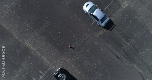 4K Ariel Shot of sports cars at the start of a drag race. Sunny Day on the airstrip for a drag race event. photo