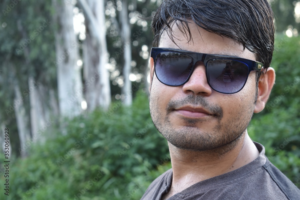 Portrait of a handsome man with sunglasses Portrait of a handsome man with sunglasses