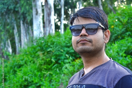 Portrait of young man with sunglasses