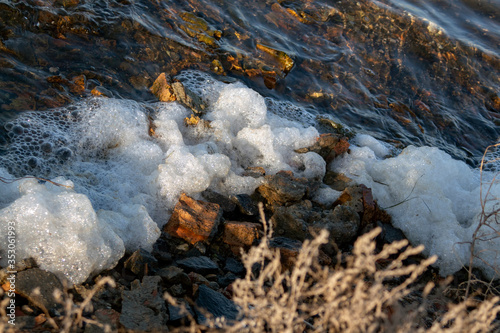 Series of foam on the shore of Salt Lake. Water pollution. Part of a photo album with pain and a seductive aesthetics of а repugnance. Pomorie, Bulgaria.