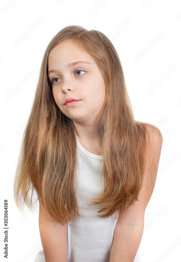 Young cute girl with grey blue eyes and long light brown hair isolated on white background Young cute girl with grey blue eyes and long light brown hair isolated on white background