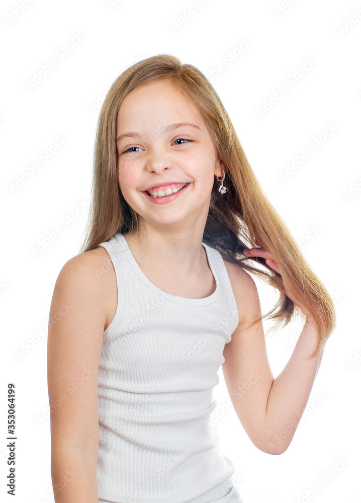 Young cute smiling girl with grey blue eyes and long light brown hair isolated on white background Young cute smiling girl with grey blue eyes and long light brown hair isolated on white background