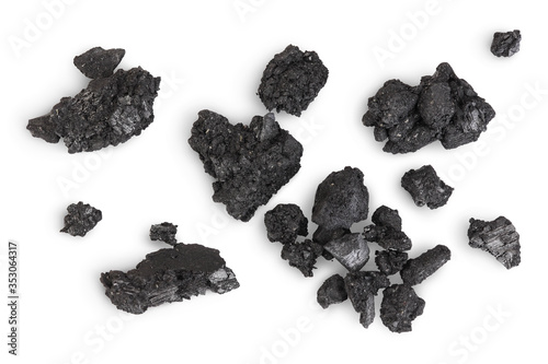 particles of charcoal isolated on white background with clipping path and full depth of field
