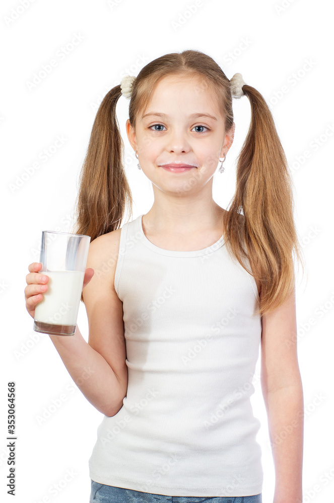 Young cute smiling girl with two hair tails and milky moustache holds a glass of milk isolated on white background Young cute smiling girl with two hair tails and milky moustache holds a glass of milk isolated on white background