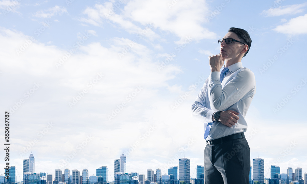 Concept of business success and control with confident boss against cityscape background Concept of business success and control with confident boss against cityscape background