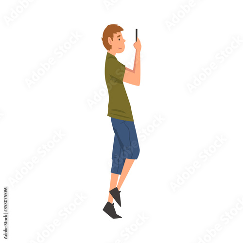 Guy Walking Outside  Teen Boy Looking at His Smartphone  Person Using Digital Gadget for Online Communication Vector Illustration