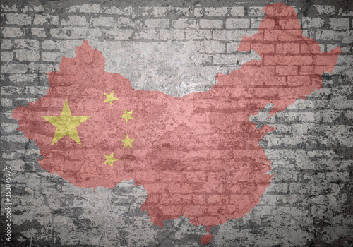 Grunge decayed faded brick wall background with the map flag of the Peoples Republic of China