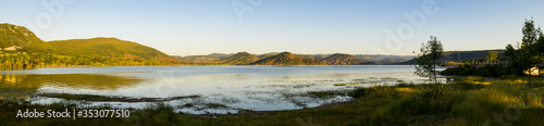 Aerial panorama of Lac du Salagou in the early morning in summer in H  rault in Occitania  France
