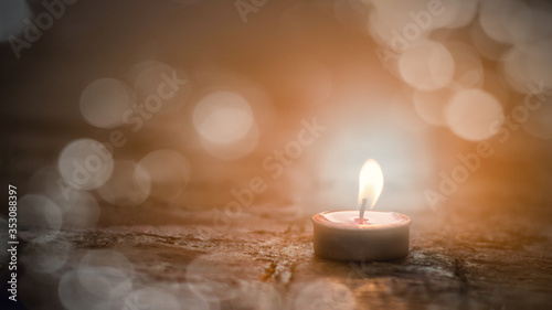 Candles light on floor with the bokeh of lights background, blurred background