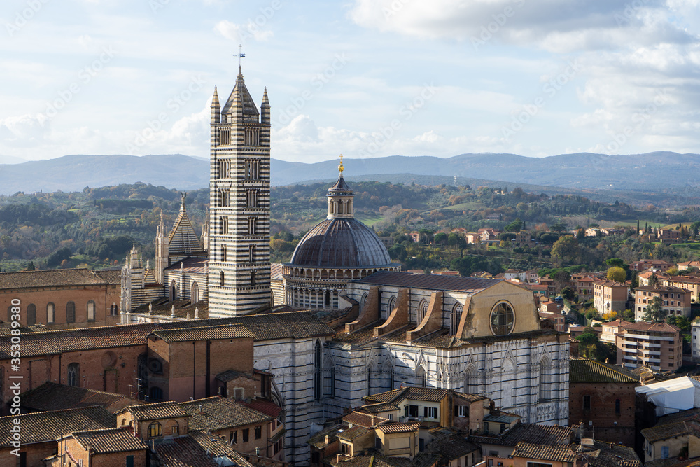 View of the Duomo and the city of Siena from the top of the tower of Mangia, Tuscany, Italy