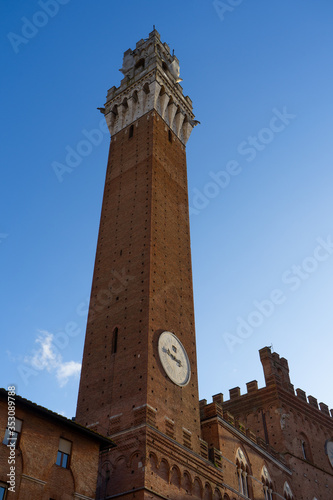 View of the Tower of Mangia in " Piazza del Campo" (Square of Campo) in Siena, Tuscany, Italy