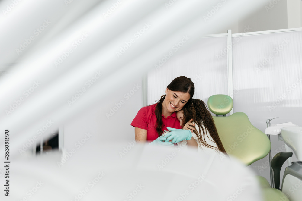 Cute girl in dental clinic. Child in stomatological cabinet with female dentist. Cute girl in dental clinic. Child in stomatological cabinet with female dentist.