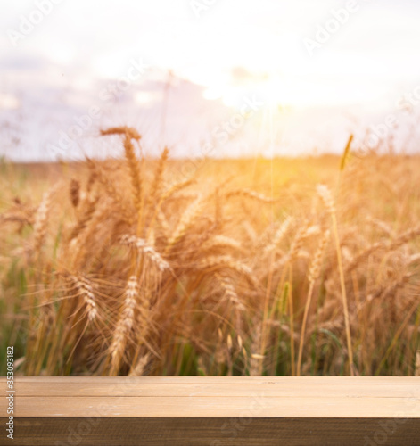 Wooden table with dark blurred background design