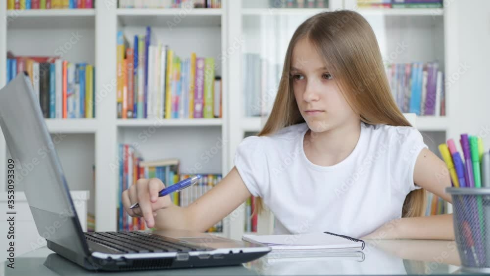 Kid Using Laptop Studying in Video Conferencing, Child Learning, Writing in Library, Schoolgirl Chatting with Teacher, Children Homeschooling, Online Education Kid Using Laptop Studying in Video Conferencing, Child Learning, Writing in Library, Schoolgirl Chatting with Teacher, Children Homeschooling, Online Education