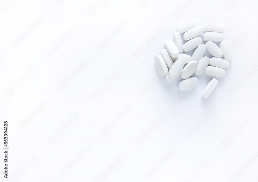 Pills of vitamin on soft light background Pills of vitamin on soft light background