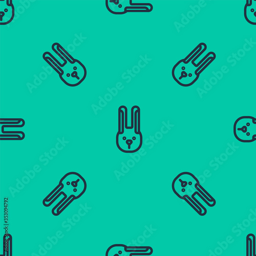 Blue line Rabbit with ears icon isolated seamless pattern on green background. Magic trick. Mystery entertainment concept. Vector Illustration