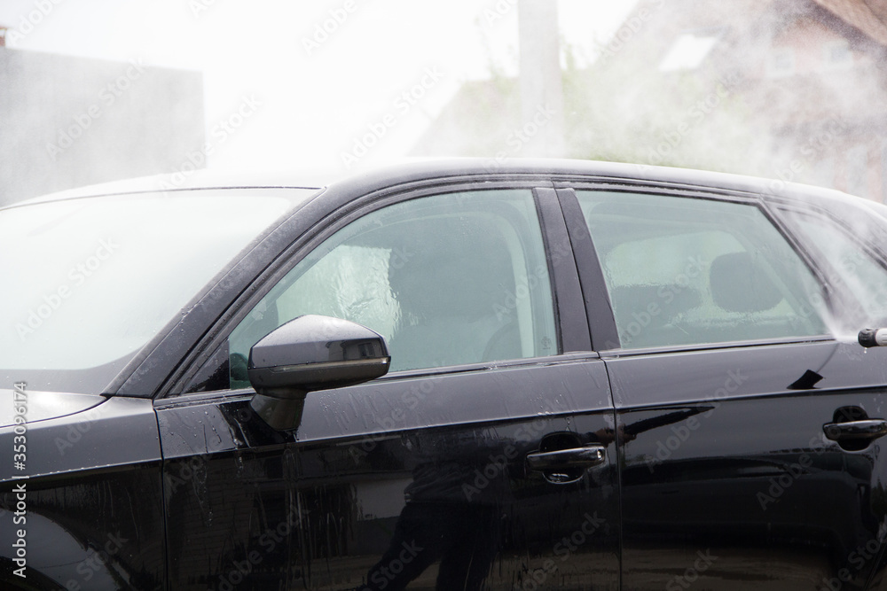 Cleaning car using high pressure water. outdoor. Cleaning car using high pressure water. outdoor.