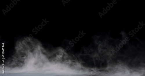 swirling smoke rolling low across the ground.