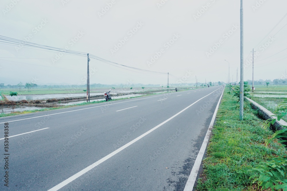 An empty road during the outbreak of coronavirus. An empty road during the outbreak of coronavirus.