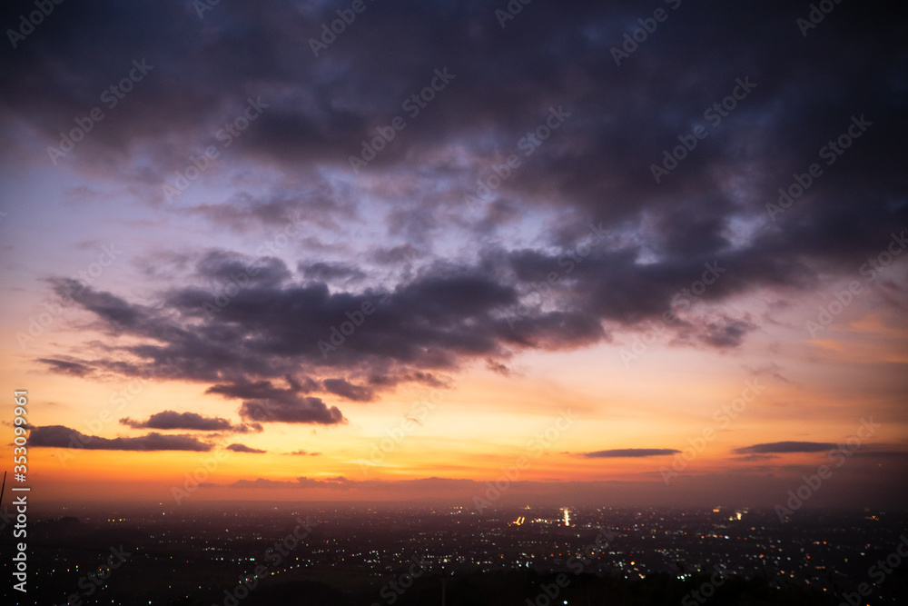 Colorful dawn / dusk sky with dark clouds