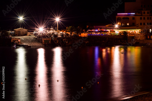 restaurants in night in the harbour in Spain.