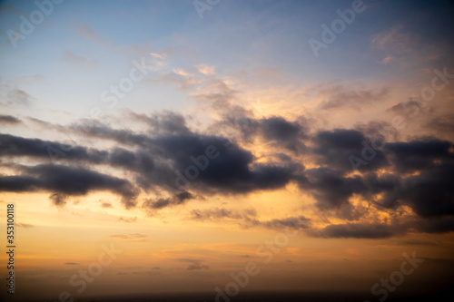 Colorful dawn / dusk sky with dark clouds