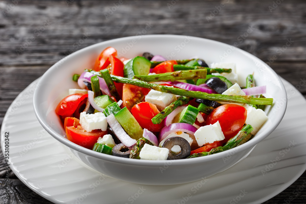 Classic organic greek salad with grilled asparagus