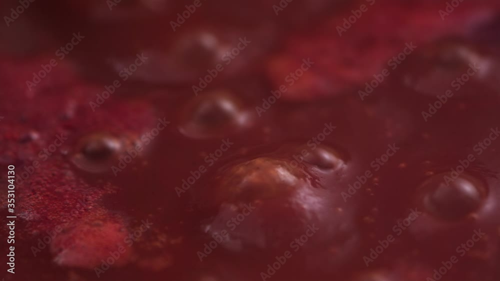 Tomato sauce boiling slow motion