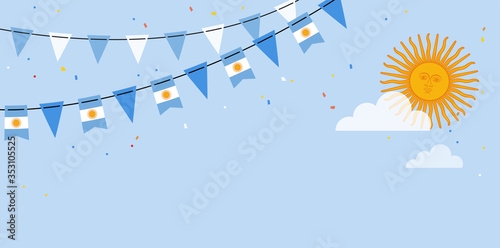 Argentina flags bunting waving on the blue sky background. banner for independence or revolution day. Background for greeting Card, Poster, Web Banner Design.