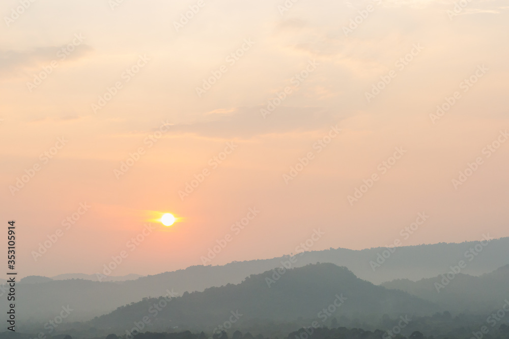 Fototapeta premium Sunset scene with silhouette mountain at Khun Dan Prakan Chon Dam 