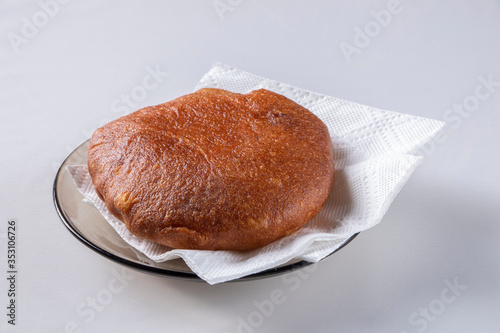 Peremech on a plate with napkins isolated on a light background. photo