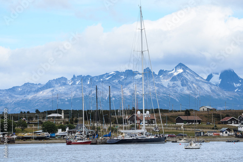 Ushuaia, City at the End of the World, Argentina. This is place is full of mountains and rivers and snow around the city center, and the city center is a little town, look like more a village than a c