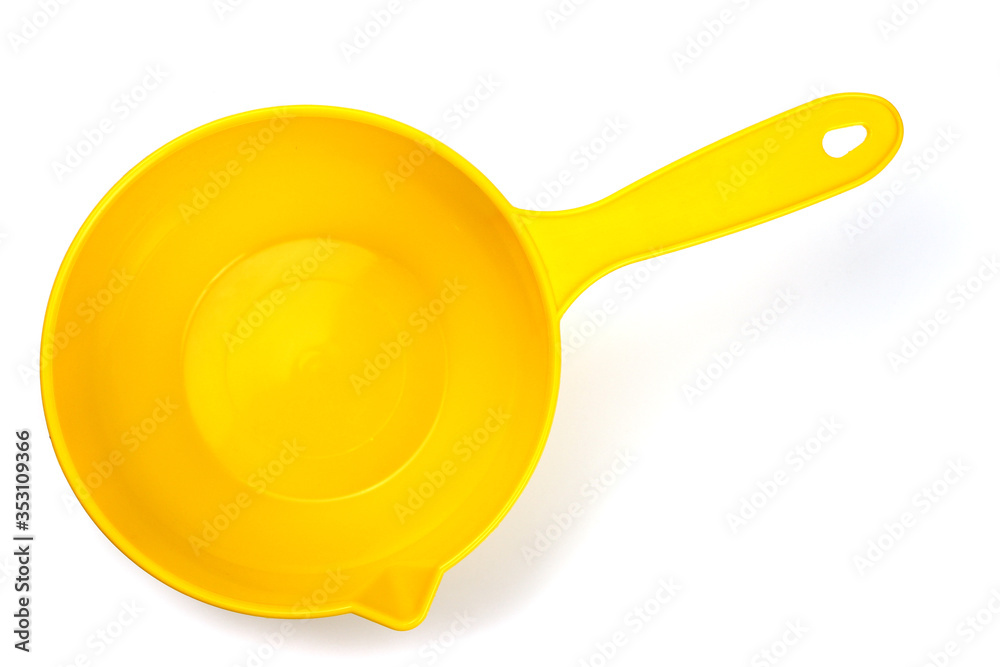 Yellow water scoop isolated on white background, top view Yellow water scoop isolated on white background, top view