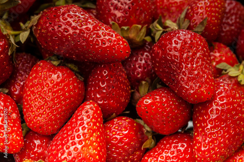 Close-up of fresh tasty strawberries. Ripe strawberry background