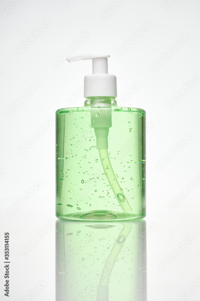 Isolated green hand sanitizer bottle with dosifyer Isolated green hand sanitizer bottle with dosifyer