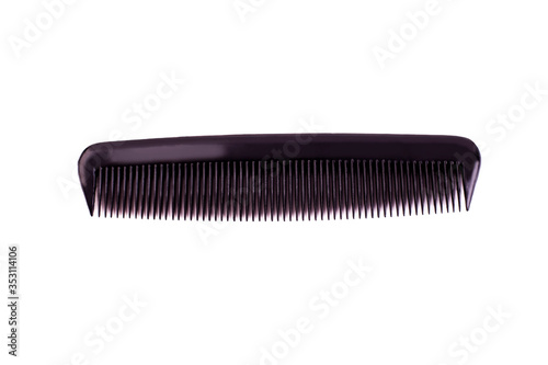 Black plastic comb isolated on white background