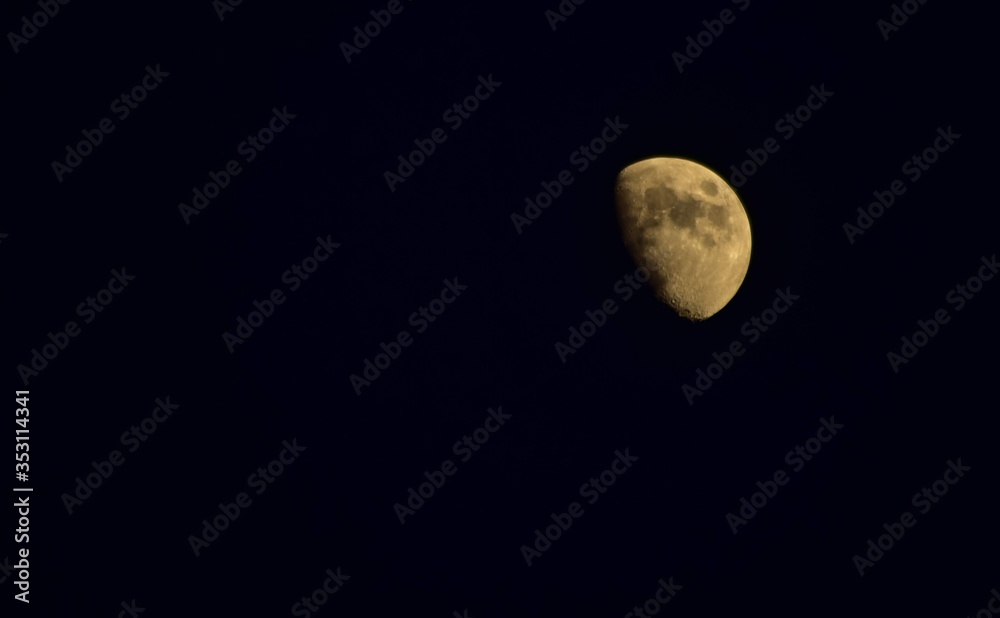 first quarter moon on night sky first quarter moon on night sky