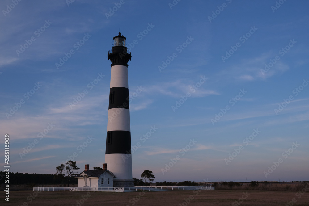 Bodie Island historic Lighthouse in the Cape Hatteras National Seashore at sunset, Outer Banks, North Carolina, USA
