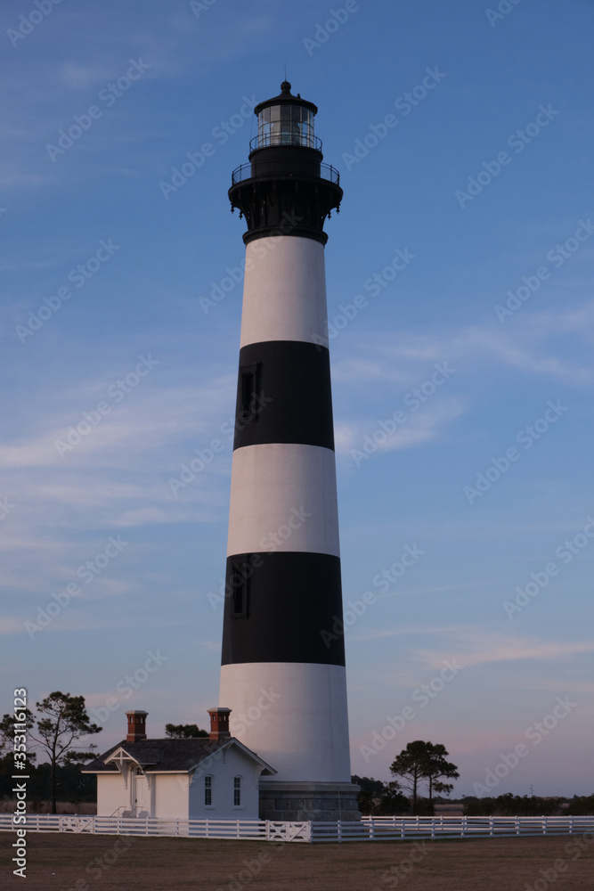 Bodie Island historic Lighthouse in the Cape Hatteras National Seashore at sunset, Outer Banks, North Carolina, USA