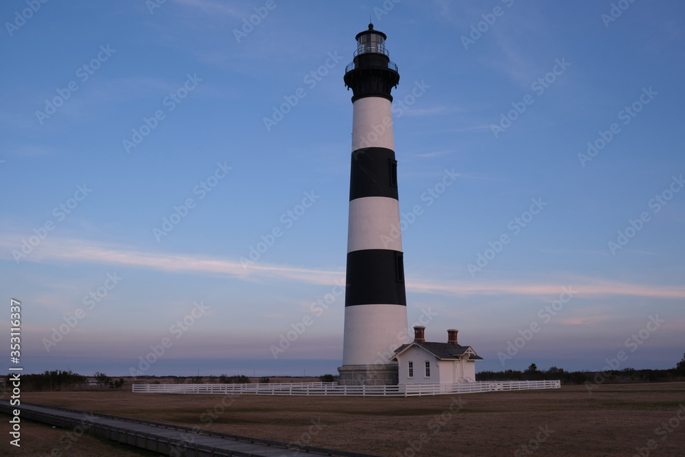 Bodie Island historic Lighthouse in the Cape Hatteras National Seashore at sunset, Outer Banks, North Carolina, USA Bodie Island historic Lighthouse in the Cape Hatteras National Seashore at sunset, Outer Banks, North Carolina, USA