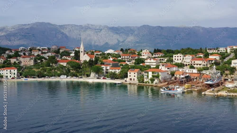 Croatia. Aerial view at the town. Vacation and adventure. Town and sea. Top view from drone at on the houses and blue sea. Travel - video Croatia. Aerial view at the town. Vacation and adventure. Town and sea. Top view from drone at on the houses and blue sea. Travel - video
