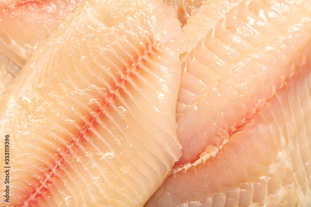 Fototapeta premium Tilapia fish fillet as background.