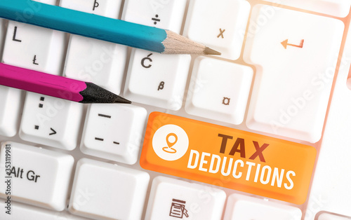 Word writing text Tax Deductions. Business photo showcasing an amount or cost that subtracted from someone s is income photo