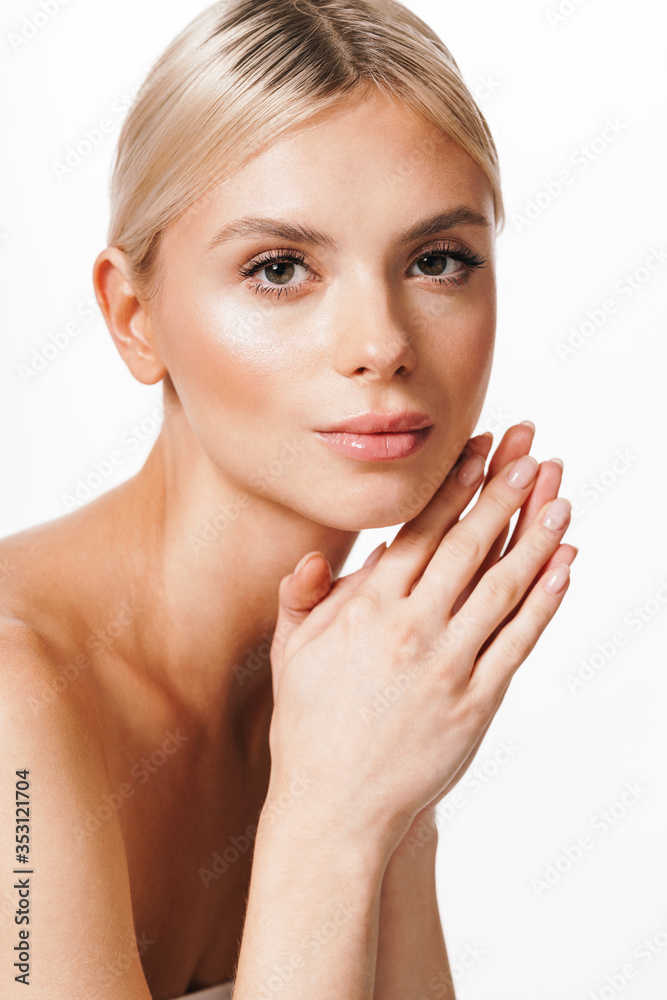 Fototapeta premium Image of seductive shirtless woman posing and looking at camera