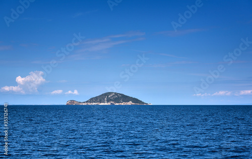 This is an uninhabited island of Kelifos in the Toroneos Gulf of the Aegean Sea, Halkidiki, Greece © nmelnychuk